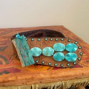 Turquoise leather belt.